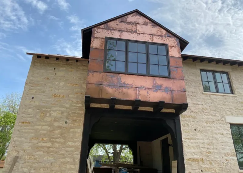 Copper metal panel facade on a stone building for Metal Roof Coating in Union Gap